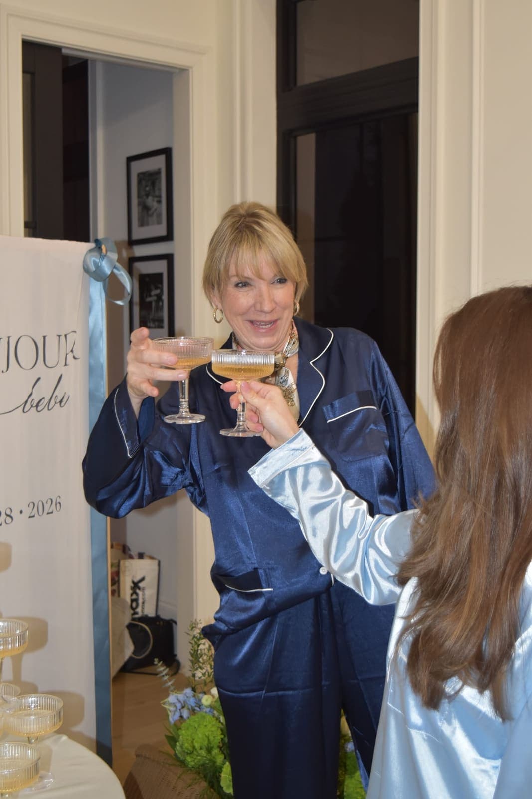 Guests toasting champagne at baby shower