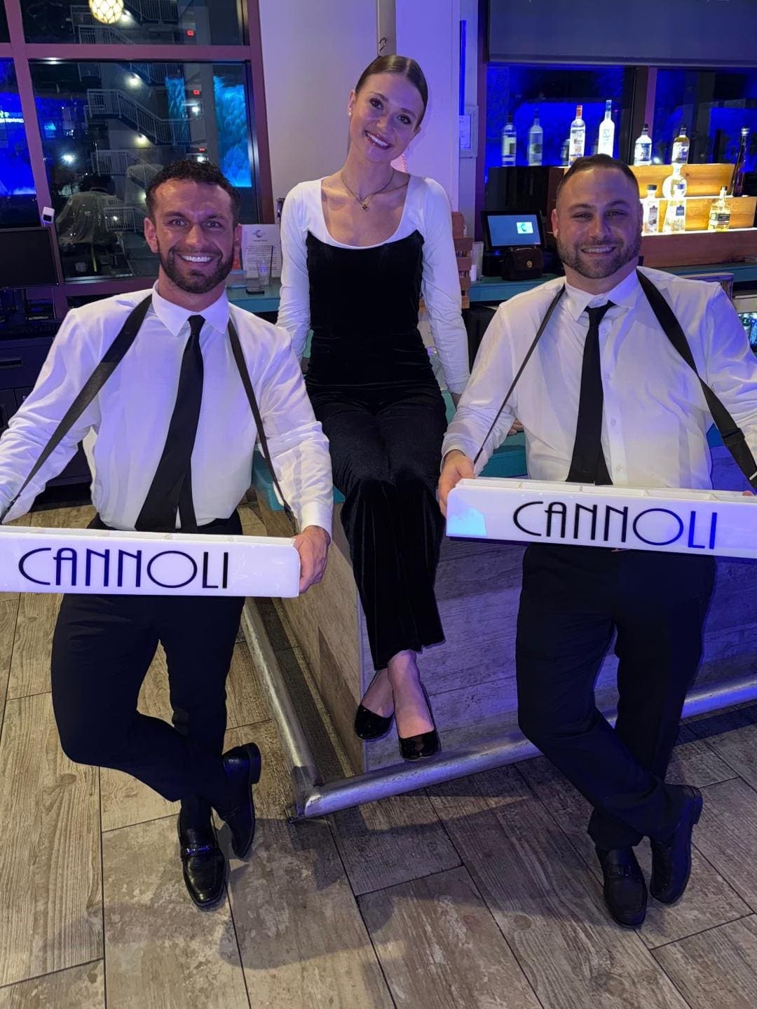 Bottoms Up Luxury team with cannoli trays