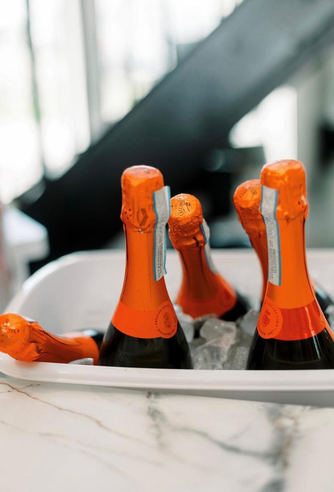 Champagne bottles chilling in ice bucket