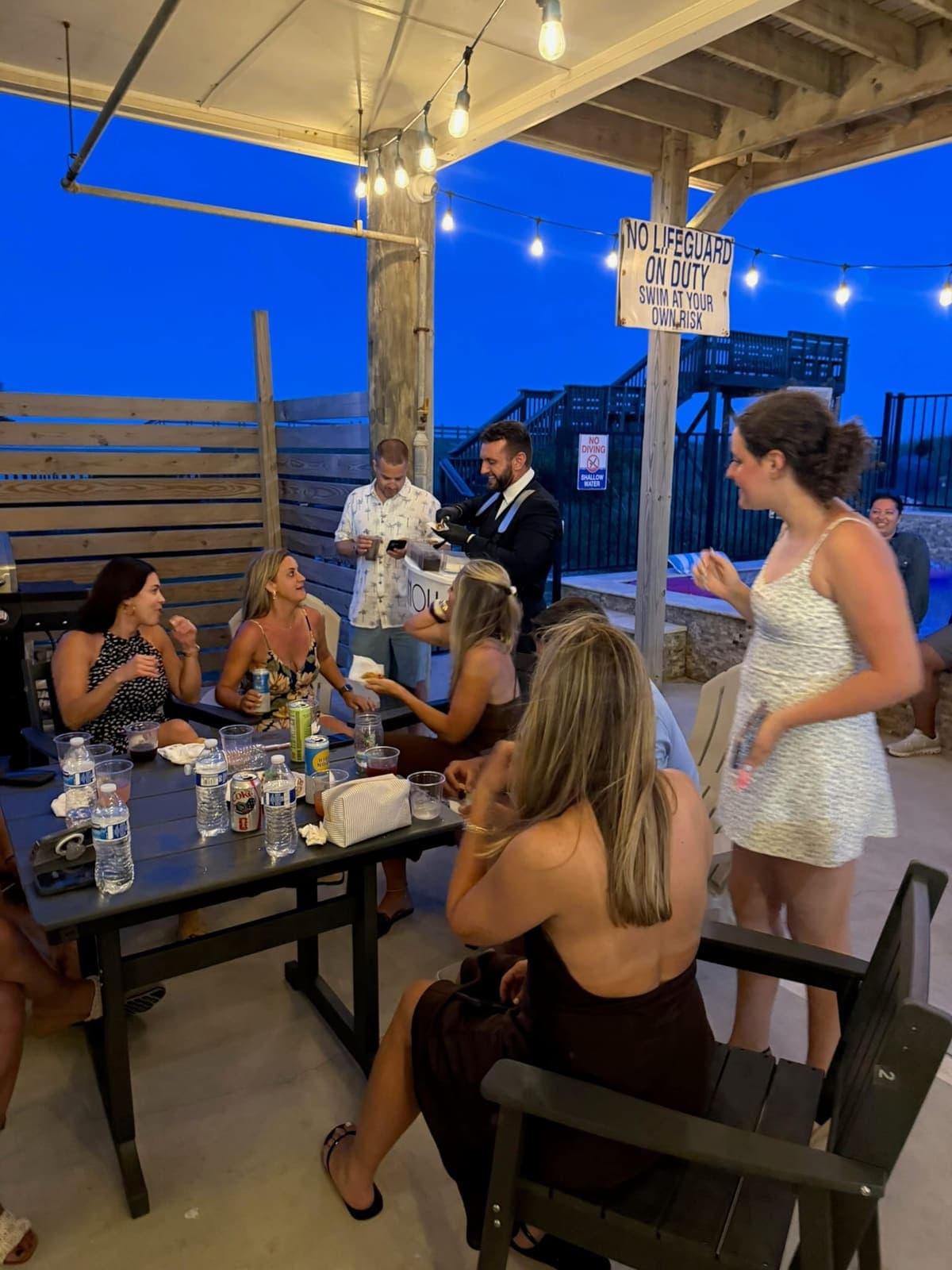 Cannoli service for guests at a poolside evening gathering