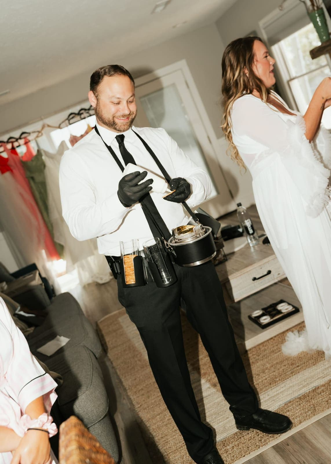 Caviar server preparing bites in the bridal getting-ready suite